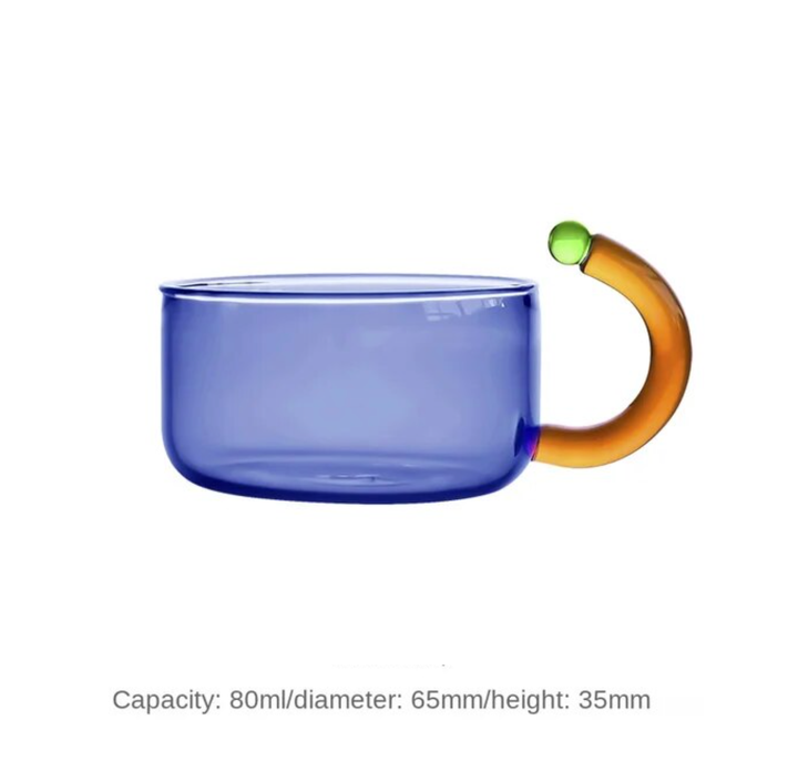 IVORE.GROUP Teeglas in Blau mit Henkel in Amber